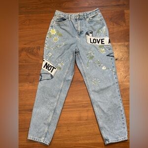 Embroidered “Love me Love me not” Jeans